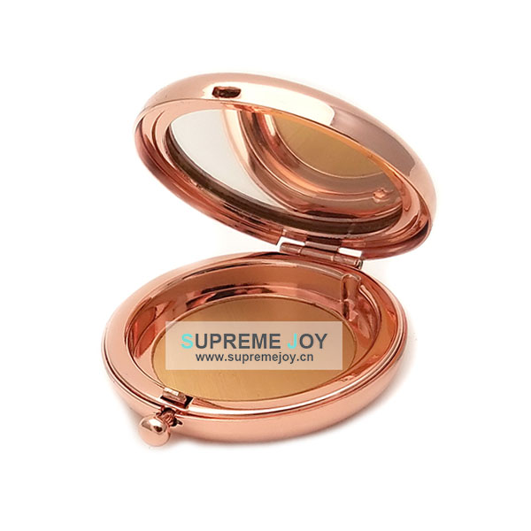 Rose gold powder compact